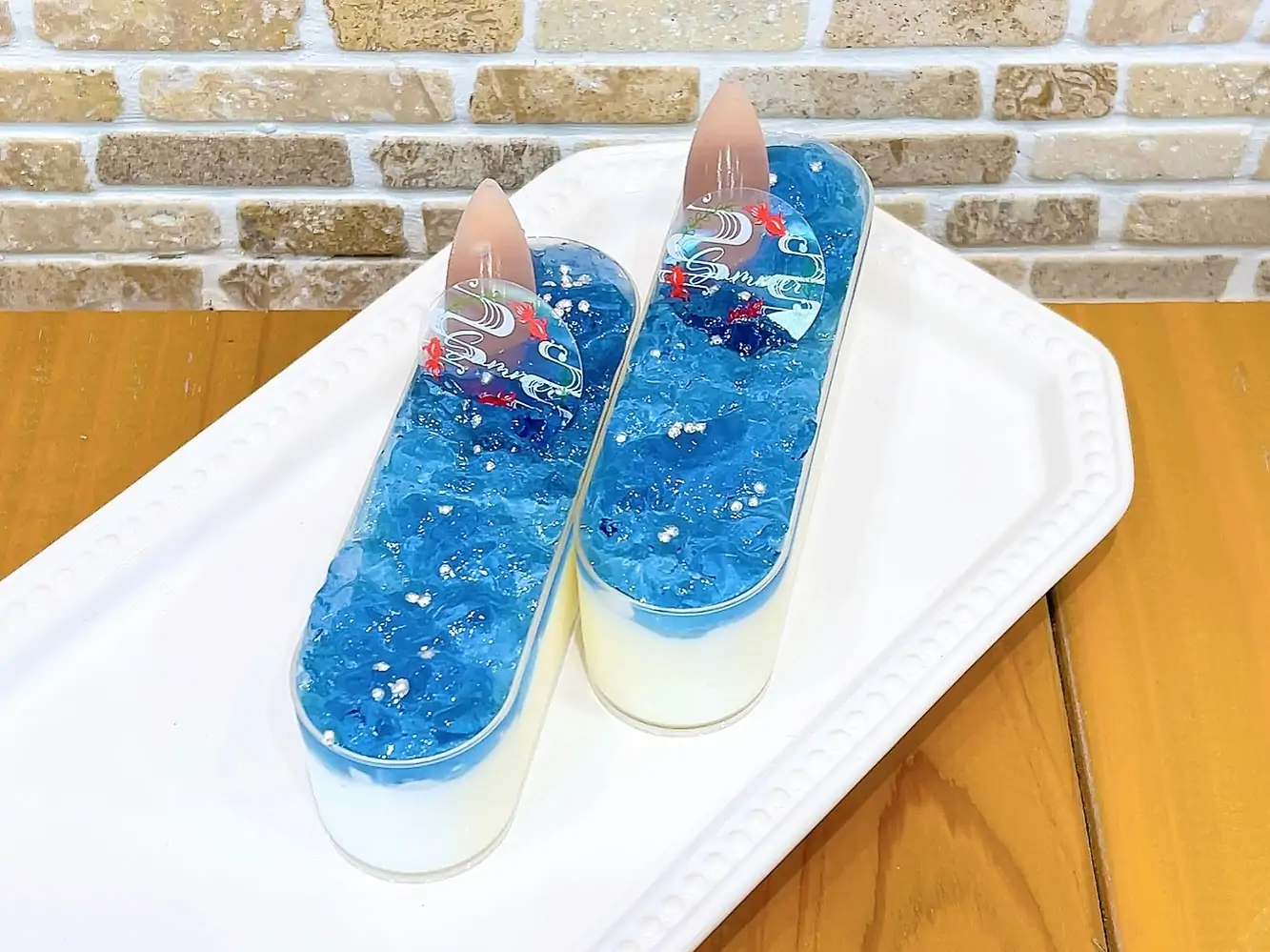 本日は七夕ですね七夕にちなんだスイーツミルキーウェイ先日から出ています♡ なめらかなパンナコッタの上には夜空を思わせるバタフライピーのゼリーがアラザンを飾って天の川をイメージしました♡ スポイトのピーチソースをかけてお召し上がりください 七夕スイーツのため、明日くらいまでの限定になります♀️お立ち寄りの際は是非♡ #七夕 #七夕スイーツ #天の川 #パンナコッタ #松戸ケーキ屋 #パティスリーはぐみ #パティスリーhagumi